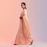 A Sophisticated Indian Woman's Refined Pastel Saree Stance | prompt for traditional look for girl instagram